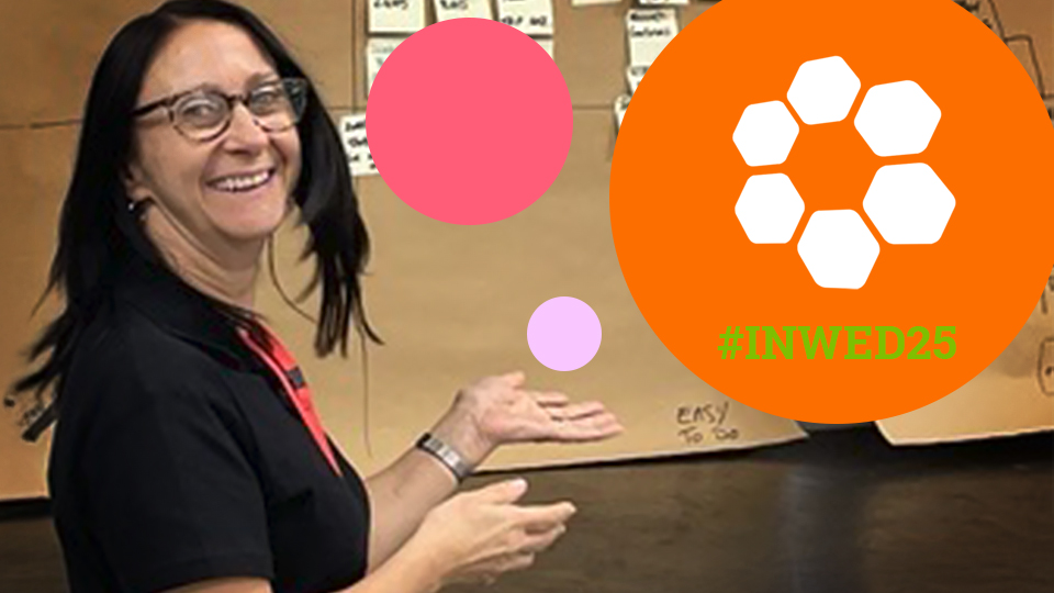 Maddie Fleming smiling while gesturing to a task board, with the INWED25 logo and graphic shapes overlaid.