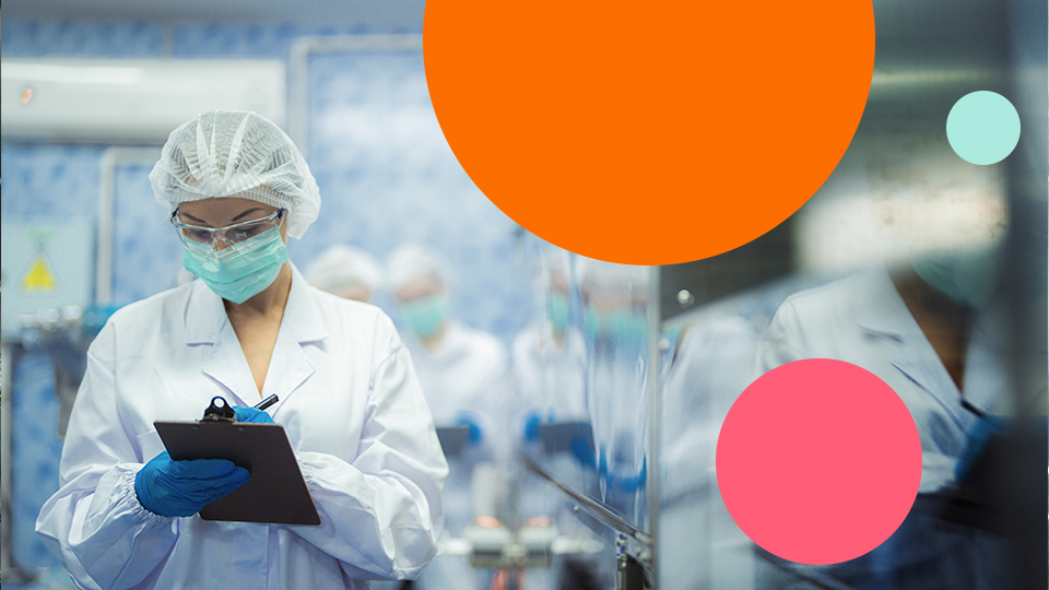 Quality inspector recording manufacturing compliance checks on the production floor