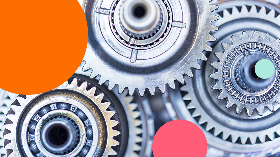 Manufacturing gears representing efficient production processes and continuous operational improvement.